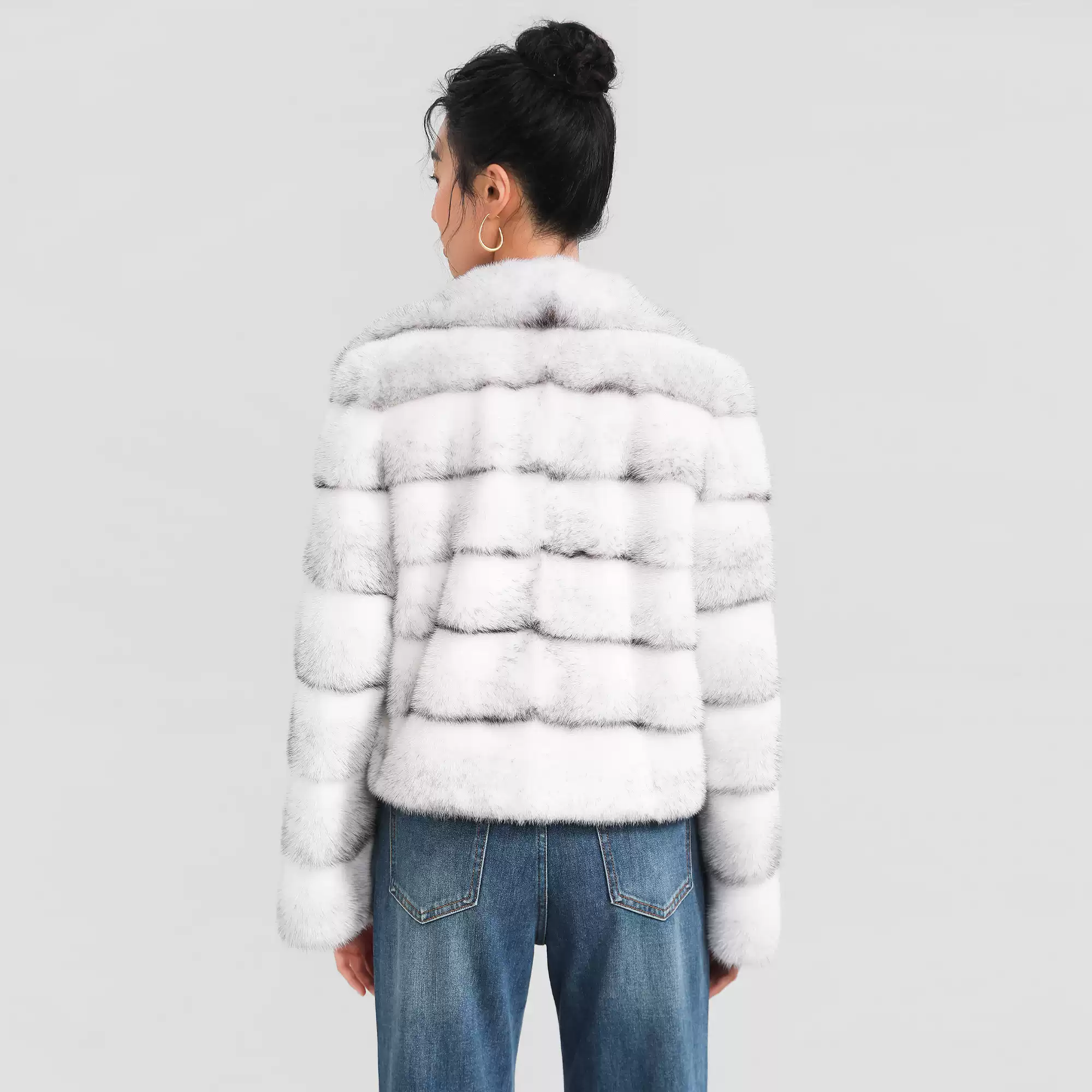 Women's elegant, minimalist, and versatile short-length natural-color Cross Mink fur coat with a lapel collar
